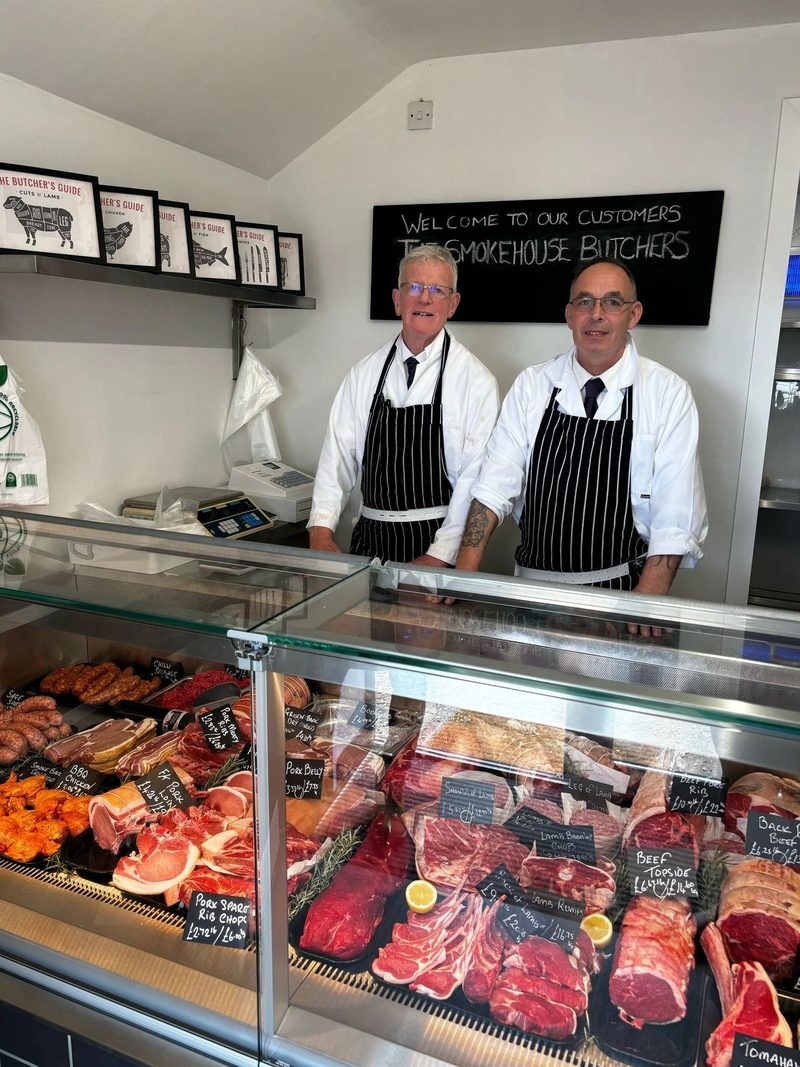 Our butchers behind a full counter of fresh cuts – Smokehouse Butchery, Monkshill Farm, Faversham